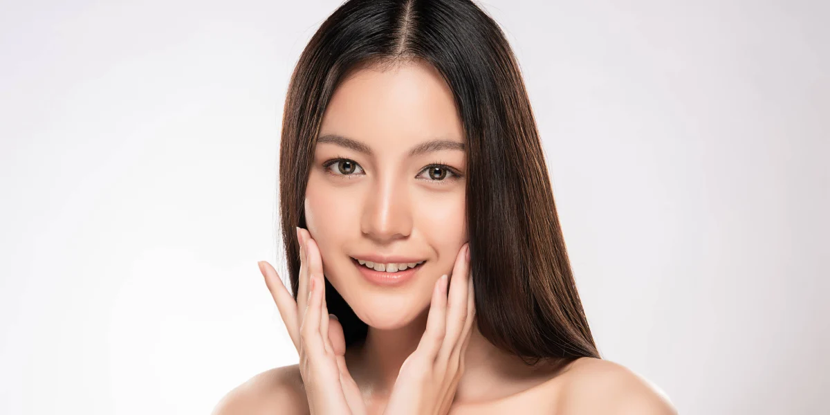 A women showing face after the facial surgery treatment in North Logan, UT