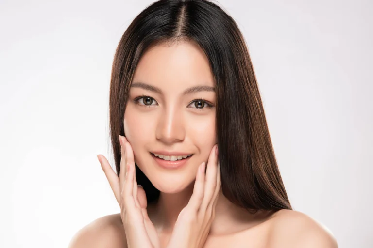 A women showing face after the facial surgery treatment in North Logan, UT